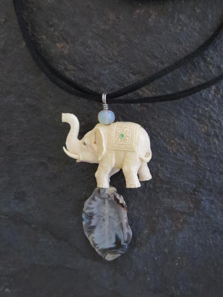 Close-Up-Hand-Carved-Mammoth-Tusk-Elephant-Necklace-by-Susan-Tereba