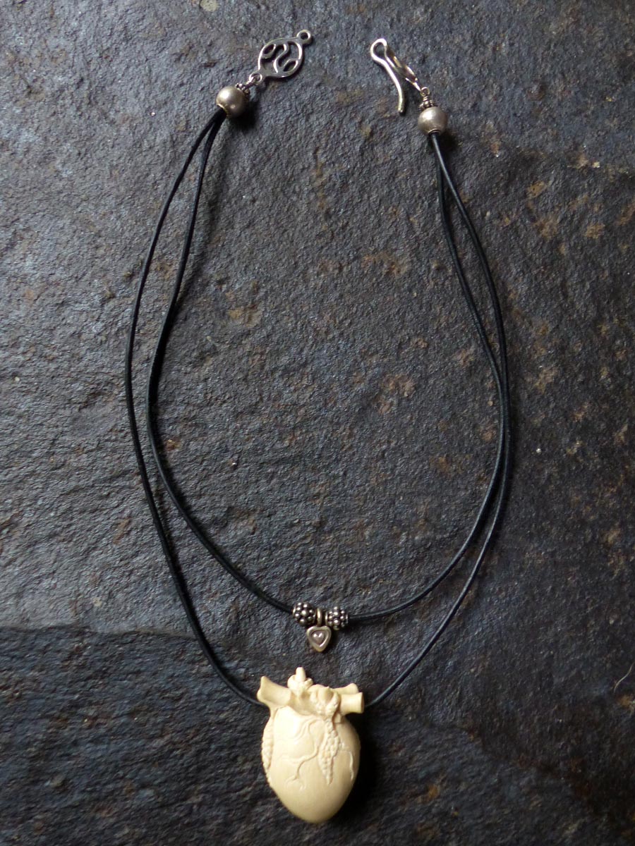 Back View Hand-Carved Mammoth Tusk Human Heart Necklace by Susan Tereba