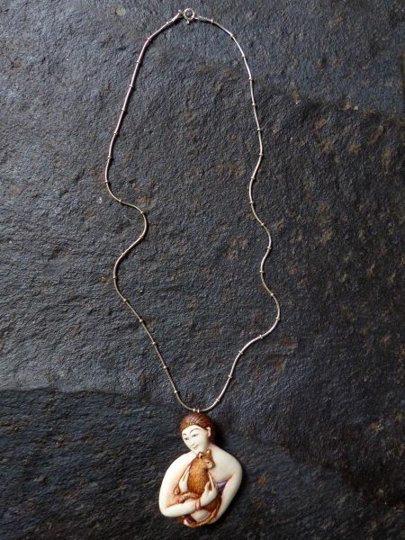 Hand-Carved Hand-Painted Bone Woman Holding Cat Necklace on Sterling Silver Chain